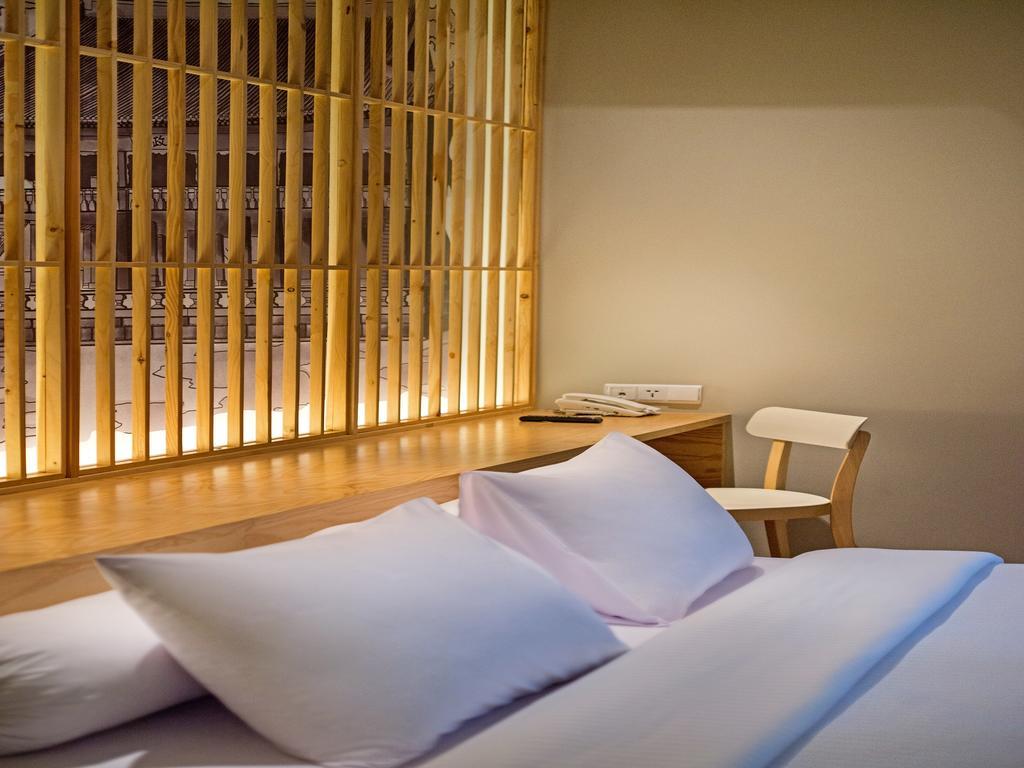 Tama Boutique Hotel Бандунг Экстерьер фото